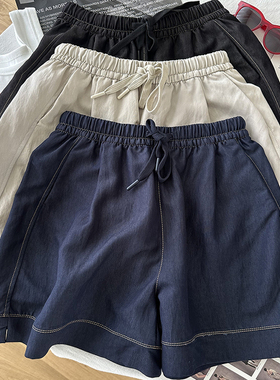 不挑身材深蓝色松紧腰抽绳冰丝阔腿短裤女夏季宽松显瘦百搭薄热裤
