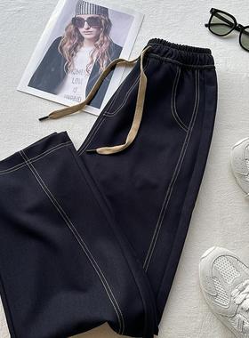 深蓝色立体裁剪直筒牛仔裤女2025秋季新款松紧腰绑带宽松镰刀长裤