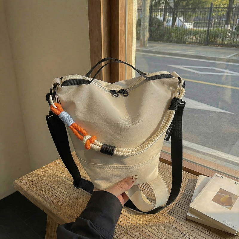 跨境新款彩绳手提水桶包轻便休闲简约帆布单肩包女士大容量斜挎包
