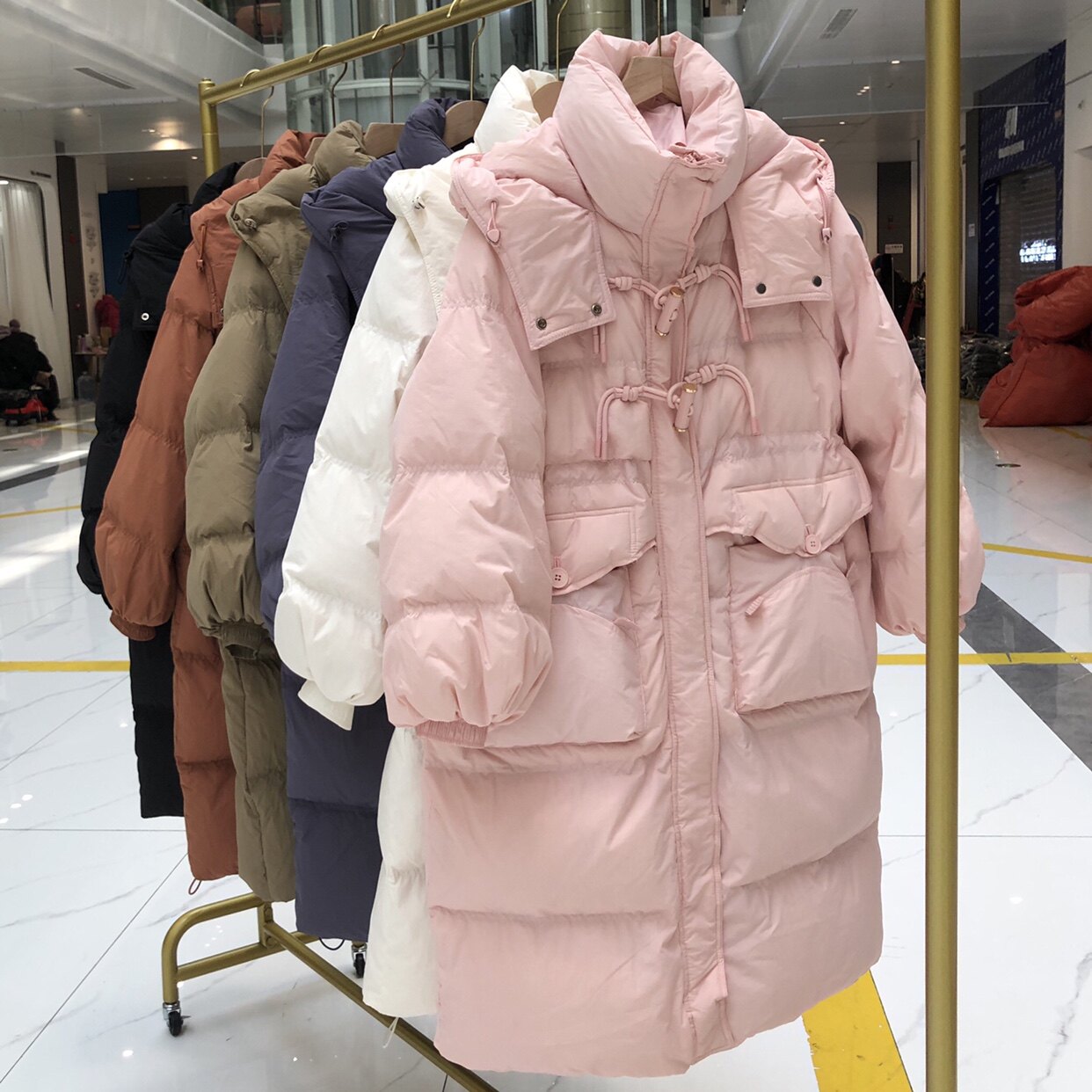 牛角扣羽绒服女收腰中长款过膝2025年新款大牌高端冬季外套反季潮