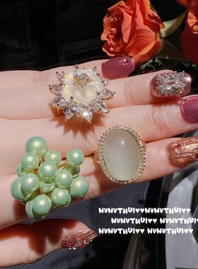 珠宝 蜜桃花海水晶太阳花宝石戒指 镀18K金 水沫玉鸽子蛋锆石戒指