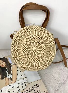 出口新款女士时尚可爱百搭春夏手工串珠手拎单肩编织包不退换