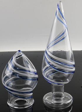 A self-pleasuring toy made of glass for use inside the anus.