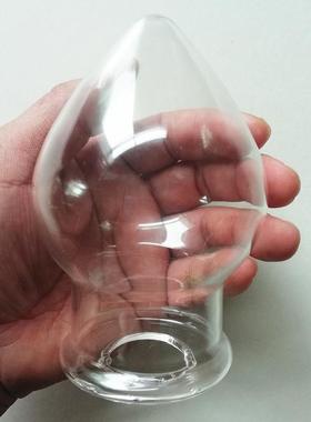 A self-pleasuring toy made of glass for use inside the anus.