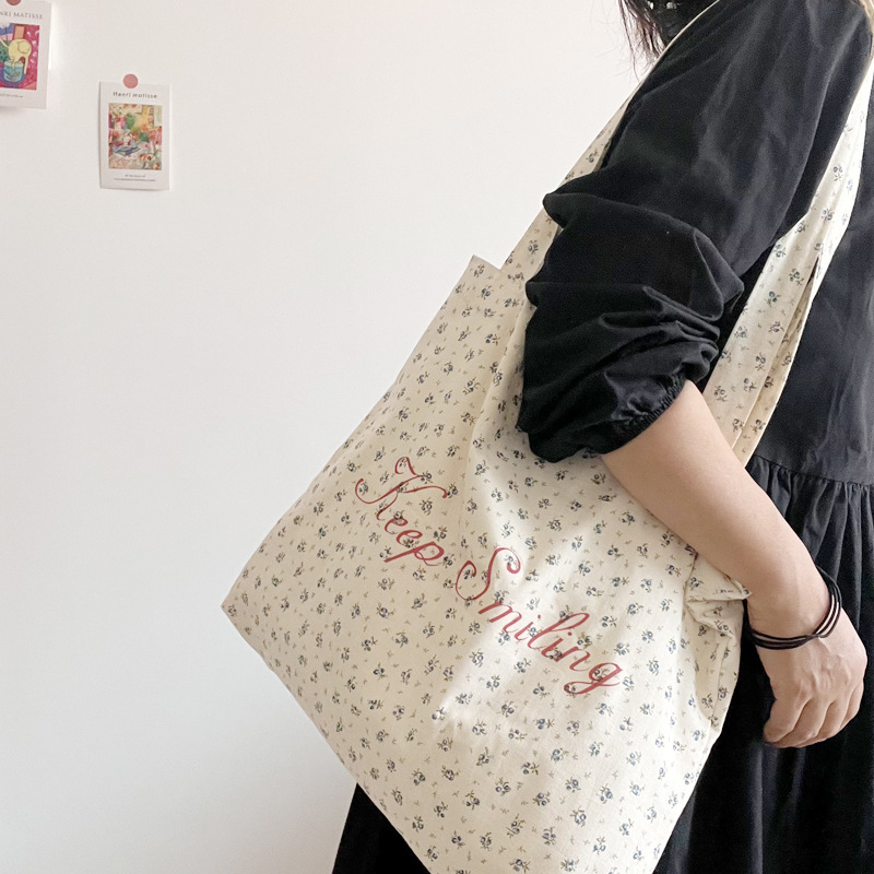 小众韩版ins法式复古月光蓝碎花字母帆布单肩包清新棉麻手提袋女