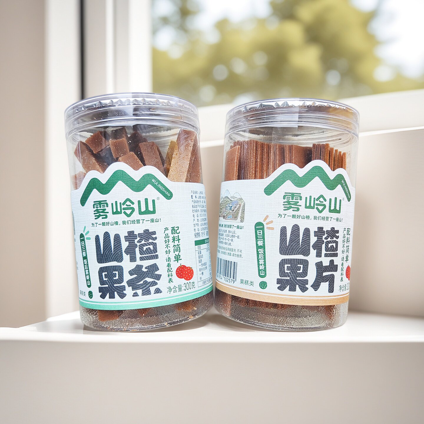 雾岭山桑葚草莓山楂果条苹果山楂片果丹皮酸甜山楂球零食罐装