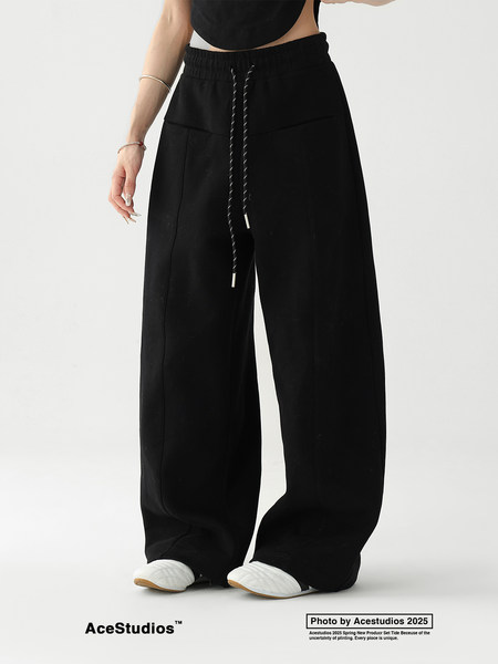 Black wide-leg pants worn by a model