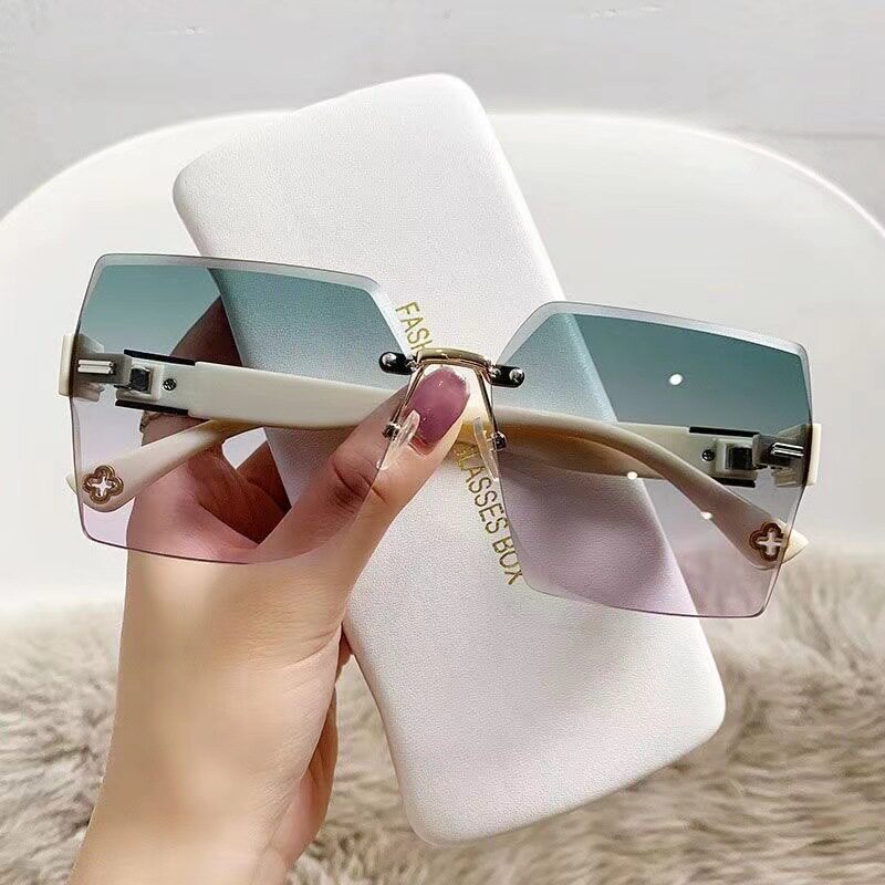 新款时尚网红太阳镜素颜女无框切边墨镜感潮流个性显瘦太阳眼镜