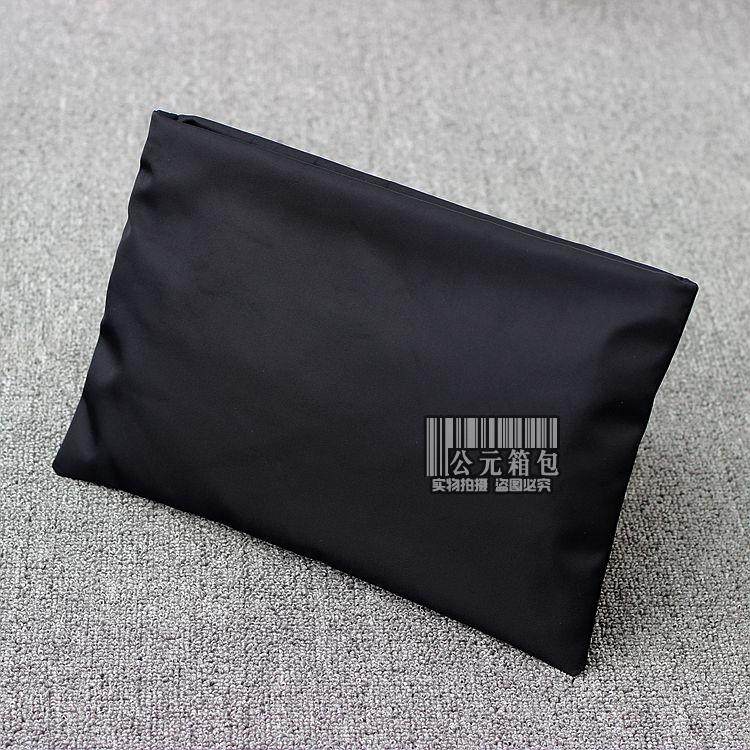 优质防水尼龙布包超薄简洁男女手包情侣金属单拉手拿包信封包潮包