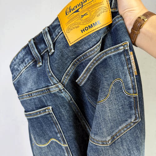 宽松小脚弹力八分男牛仔长裤