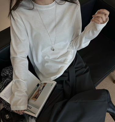 韩国单one 2026早春后背贝壳扣卷边圆领纯棉百搭长袖白T恤女上衣