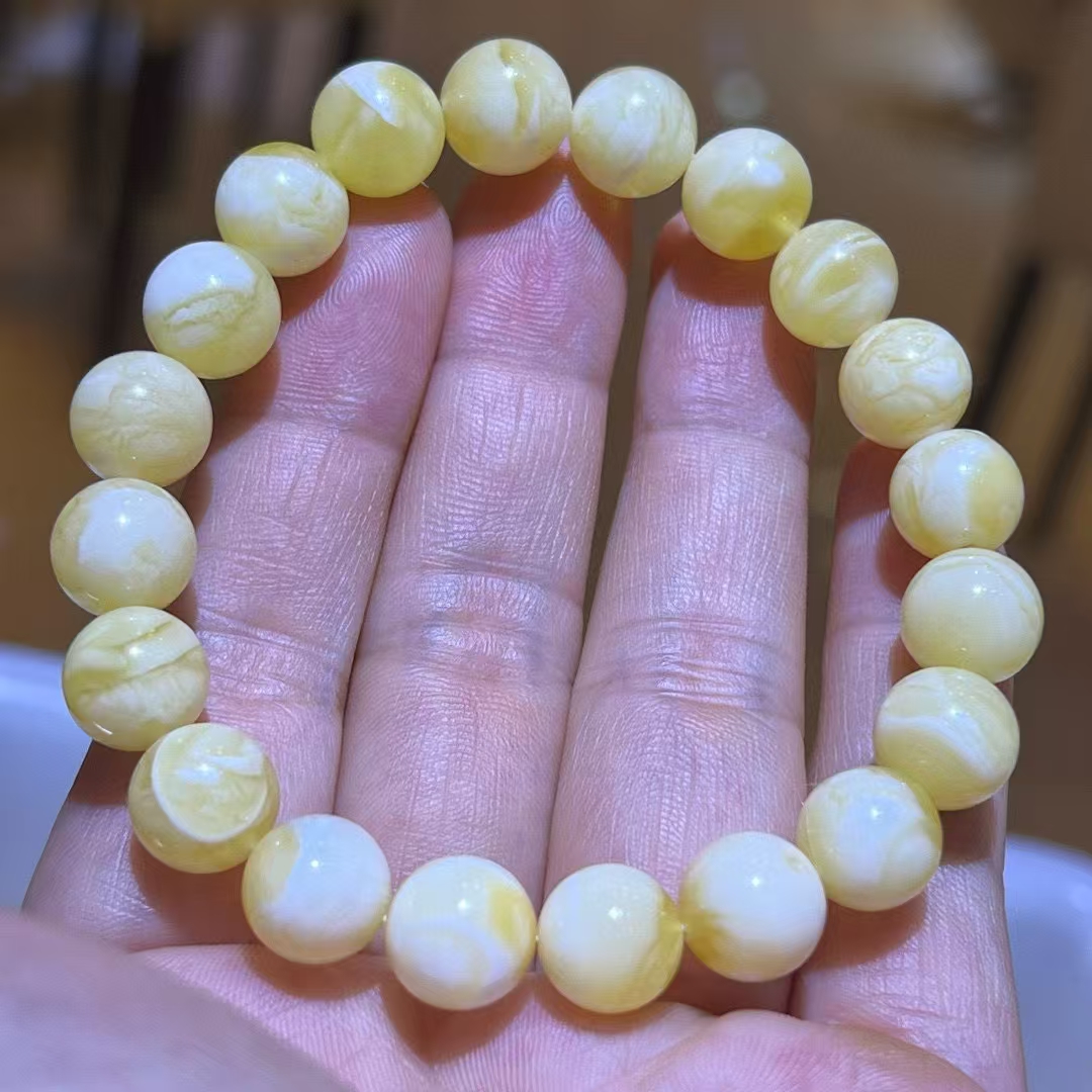 10mm以上，俄料白花蜡圆珠手串，纹路明显且多，11.79克，附证书