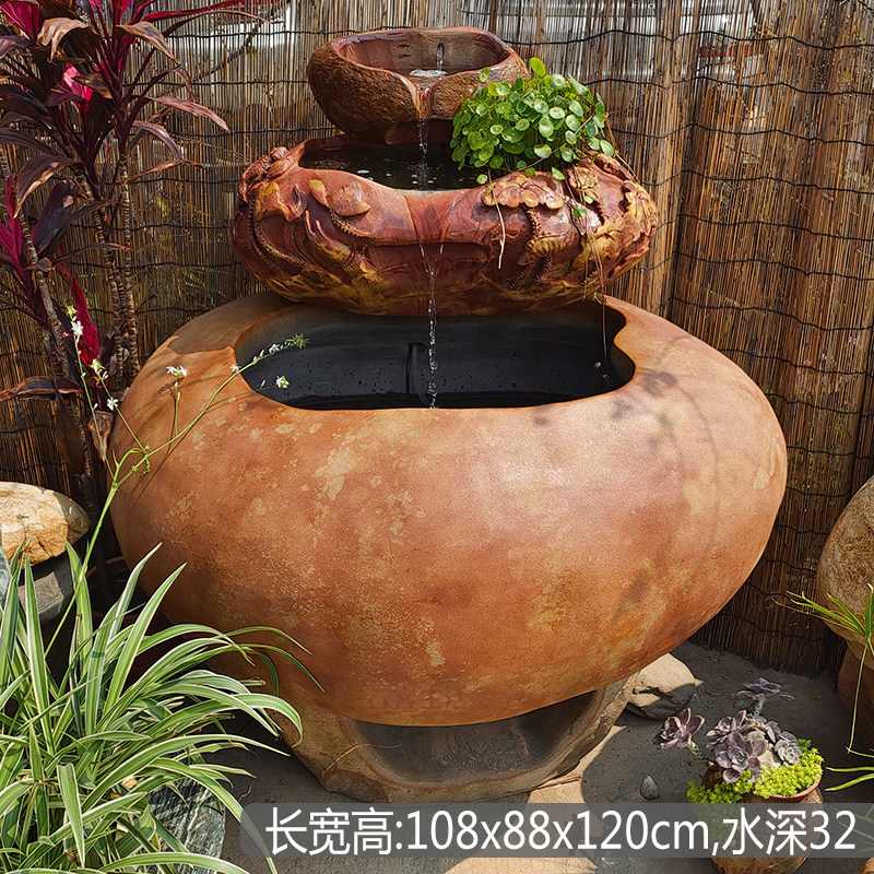 石头中式浮雕叠层流水鱼缸水景