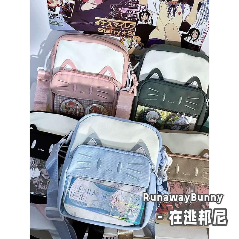 可爱猫咪单肩斜挎痛包小食量透明吧唧谷子包女卡通新款学生小方包