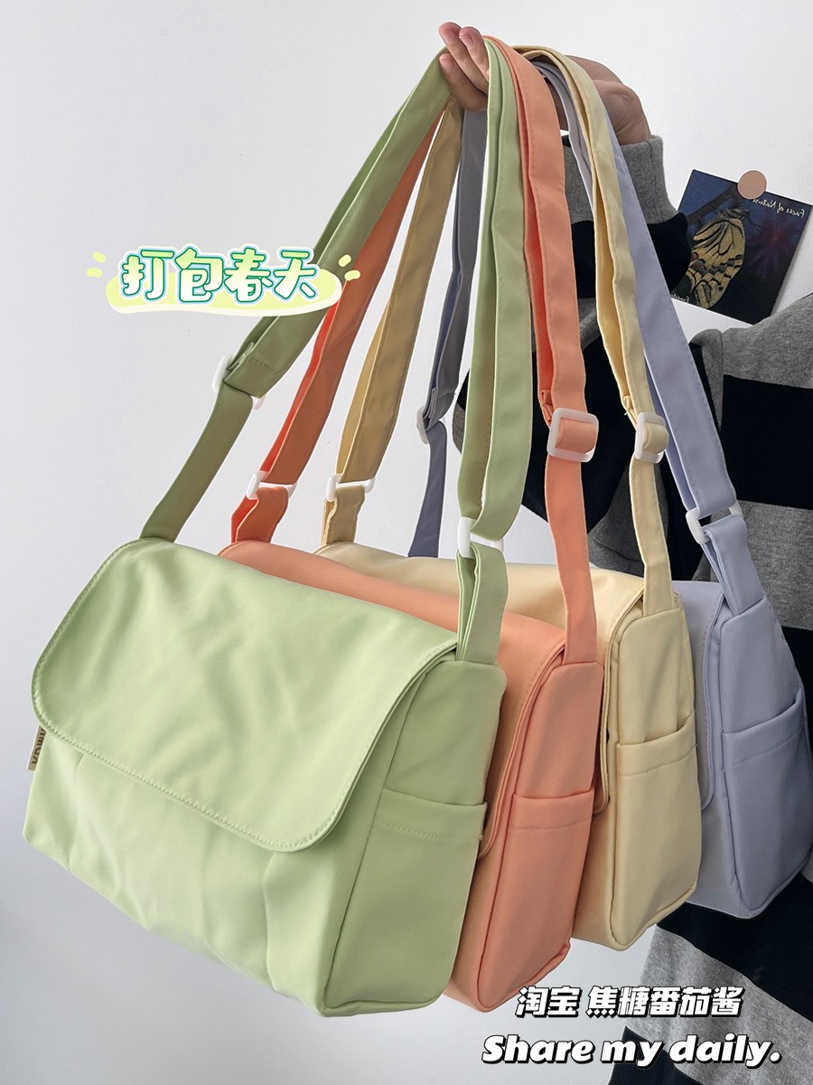 日系简约纯色文艺百搭学院风ins单肩斜挎包女尼龙小众韩版邮差包