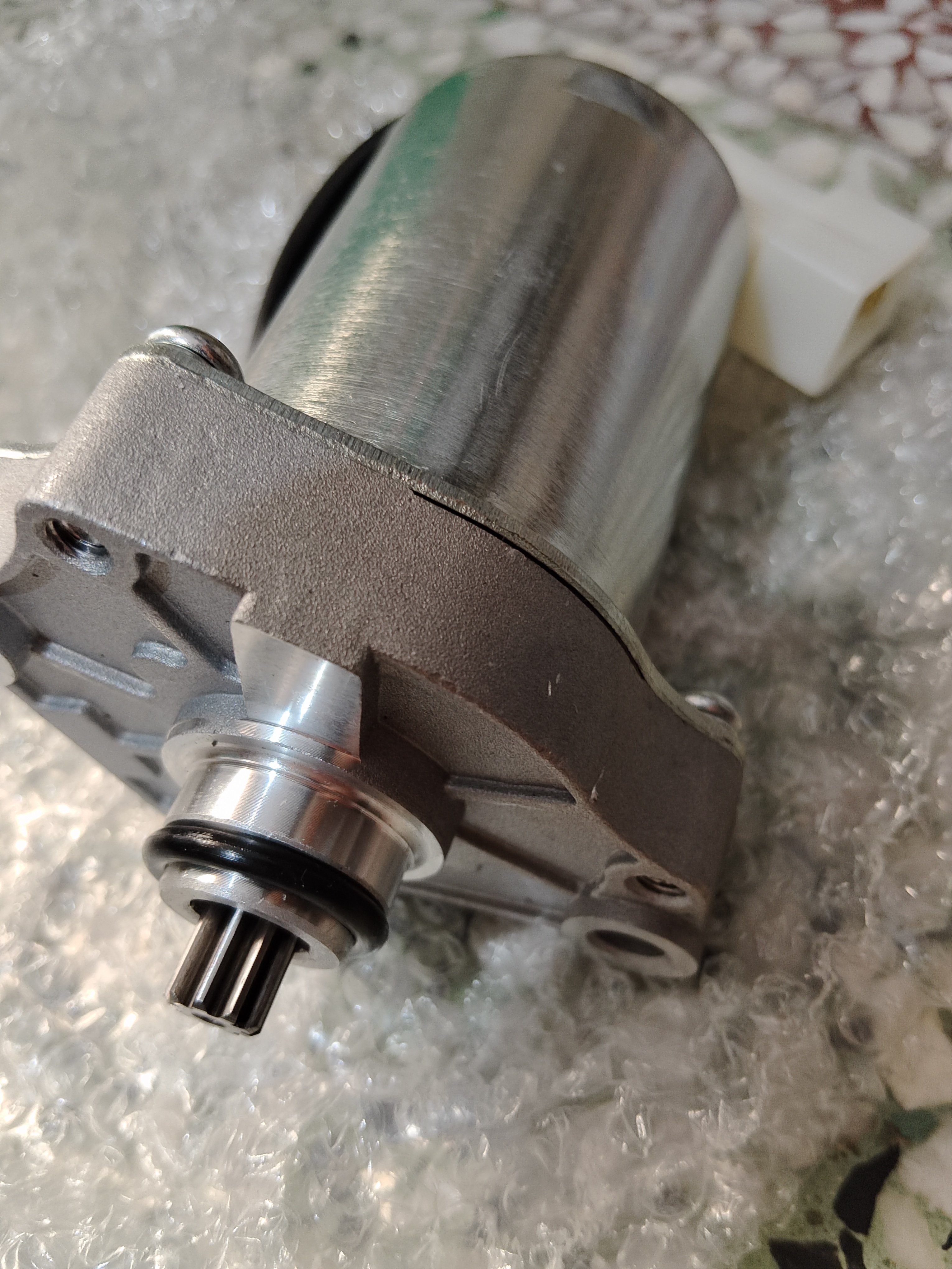 铃木小海豚马达乐至110起动机