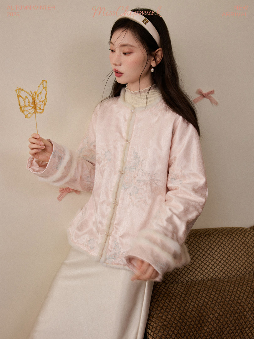 Pink satin button-up jacket worn by a model