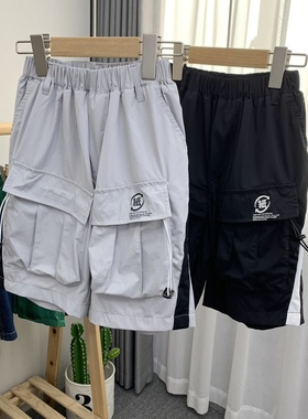 木糖橙童装新夏装儿童个性口袋速干面料男童工装裤中裤35055