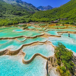 九寨沟至黄龙风景区直通车大巴拼车一日周边游
