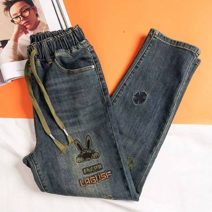 松紧高腰牛仔裤女2025春秋刺绣弹力显瘦九分大码微胖mm老爹哈伦裤