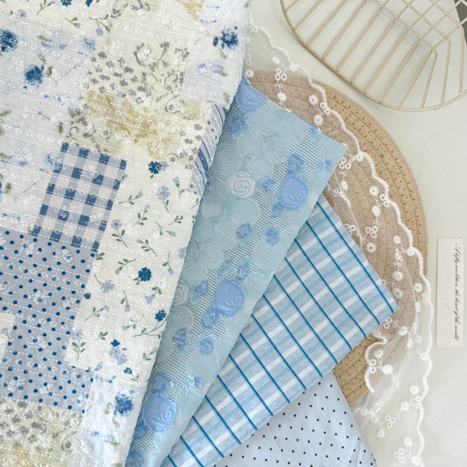 海盐蓝拼布碎花玫瑰网纱布料图片