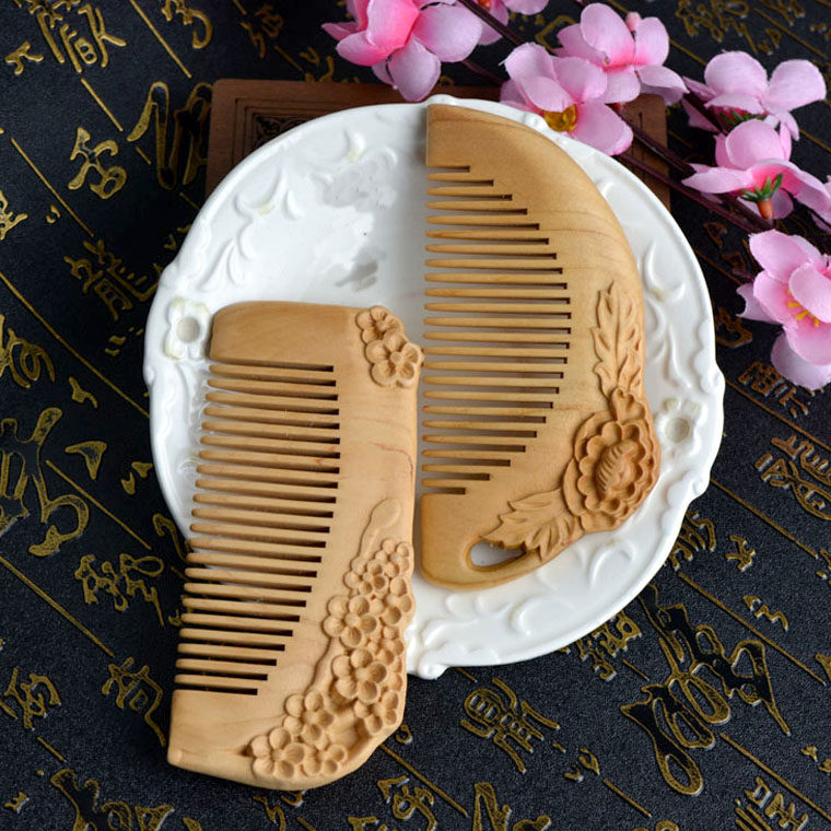 正品桃木梳子天然整木实木雕花 送情侣礼物手工制作 按摩梳 带孔