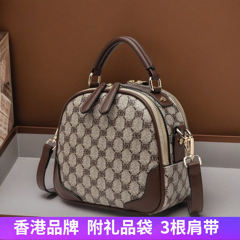 正品香港品牌真皮双层口袋休闲时尚手提单肩斜挎包小圆包2026女包