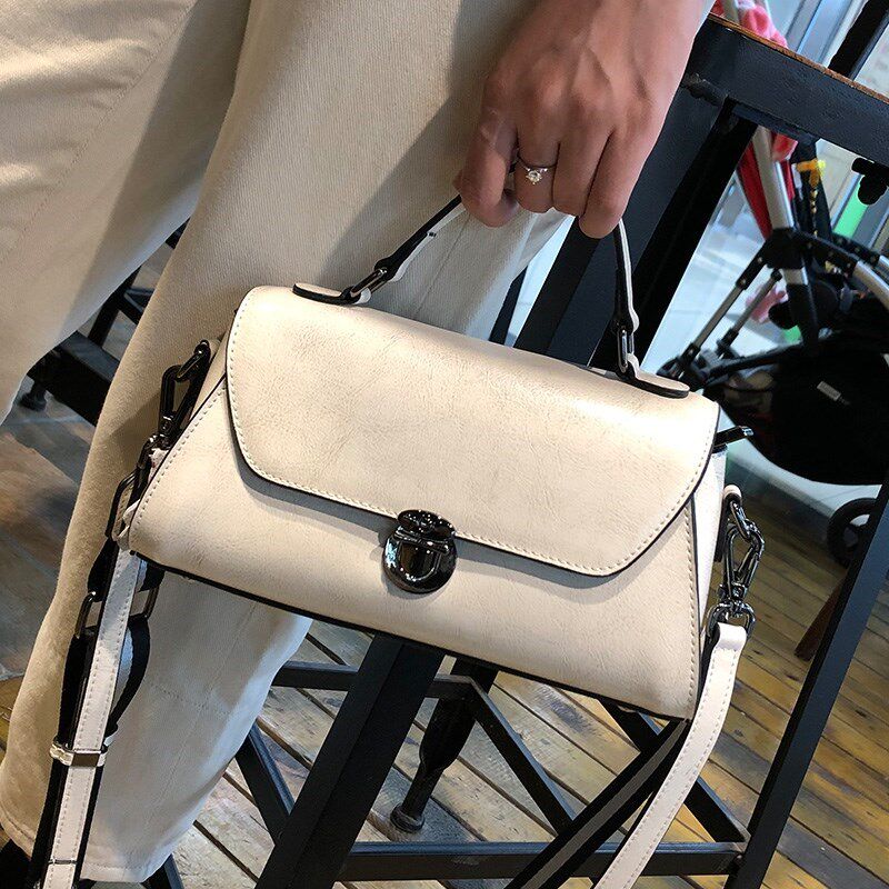 潮牌高级感真皮手提女包春夏新款时尚百搭小众女士斜挎包白色包包