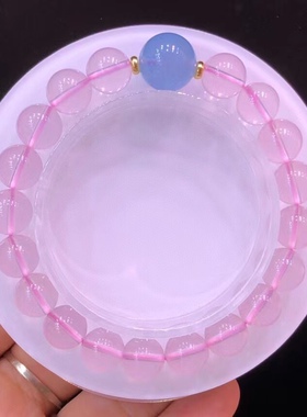 天然莫桑比克星光粉手串搭配海蓝宝珠子。规格9.5mm。重：23.5克