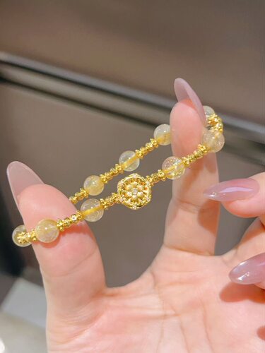 足金点钻转运珠+足金金珠隔片+天然金发晶手链  3.3g左右