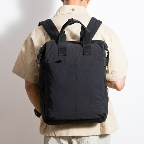 简约男女双肩包帆布学生书包电脑