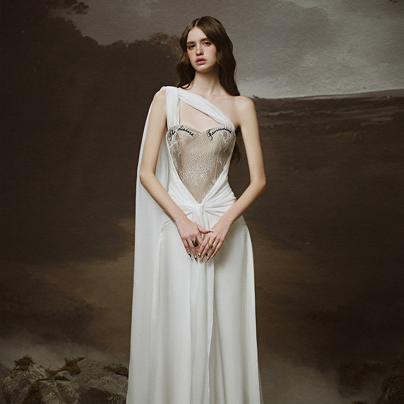 越南小众LINH PHUNG 2025年夏季新款拼接设计感花纹卡其连衣裙