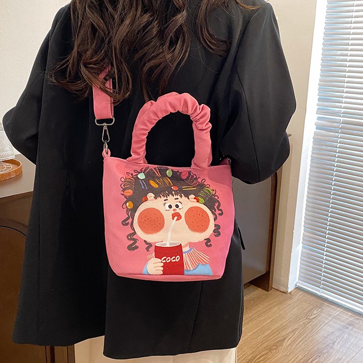 可爱小众帆布包包女2025新款夏带饭手提袋饭盒便当包休闲斜挎小包