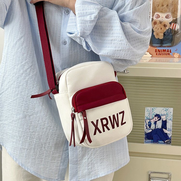 儿童斜挎包女孩中大童外出旅游小背包可爱手机包小学生轻便单肩包