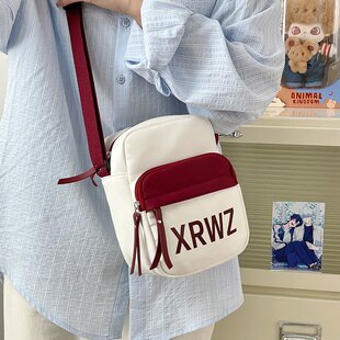 儿童斜挎包女孩中大童外出旅游小背包可爱手机包小学生轻便单肩包