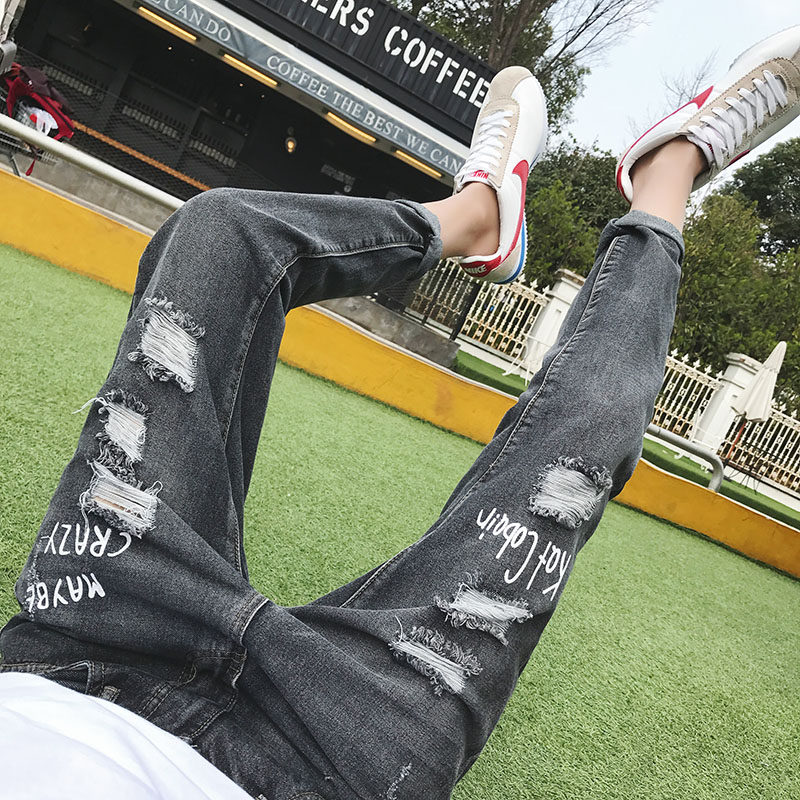 Autumn alphabet printed broken hole slim fit 9-point jeans Korean student beggars pants personalized pants