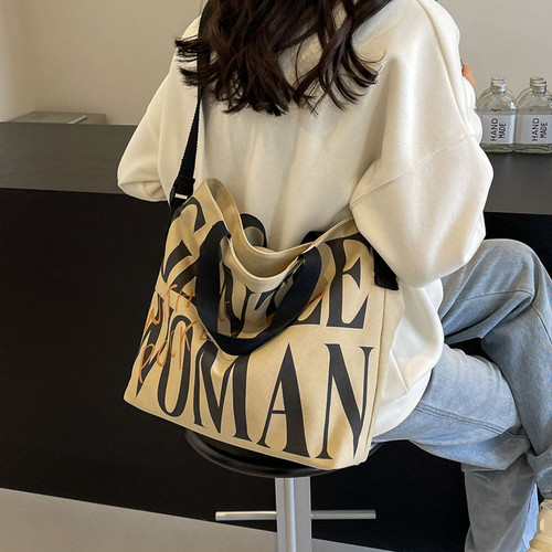 斜跨帆布包2025新款大容量包包女字母百搭时尚单肩斜跨手提包托特