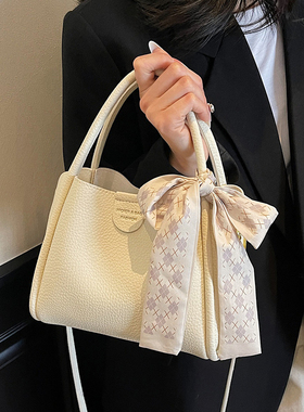 手提包包女2025新款夏季小众水桶包通勤百搭单肩斜挎包流行