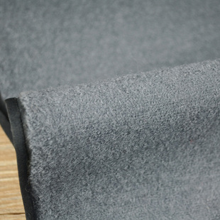 湖蓝灰弹力针织100%纯羊毛布料 软中带挺抗皱好 背面复合衬里