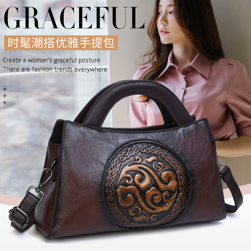品牌中国风压花手提包包女2025新款时尚中年妈妈包百搭单肩斜挎包