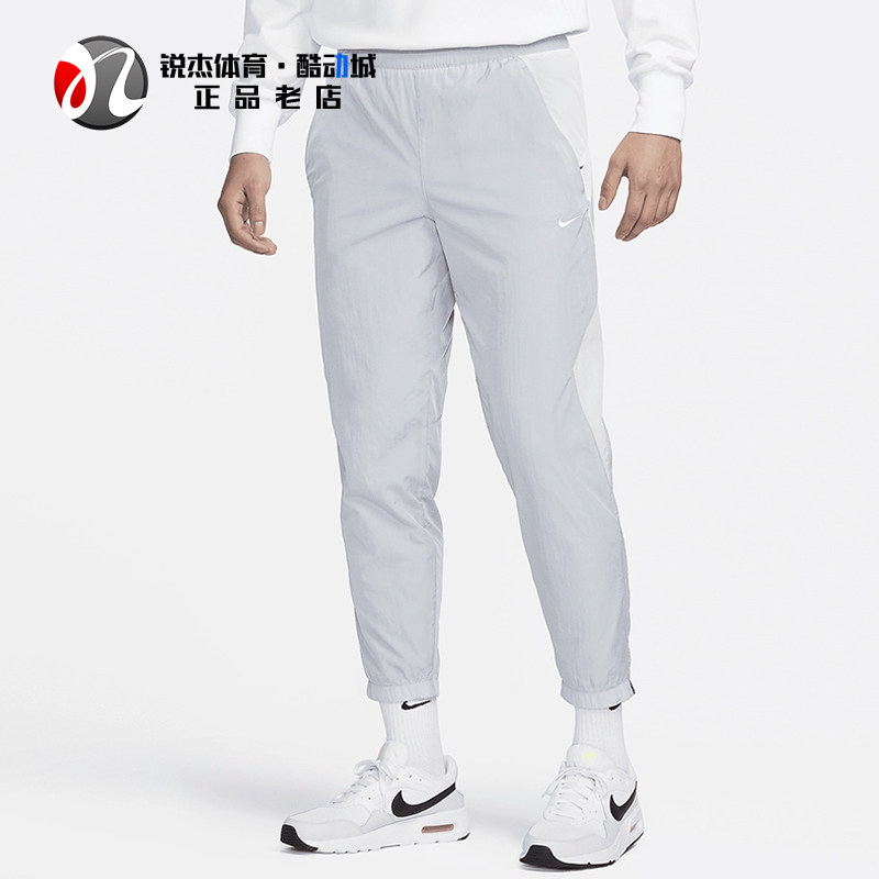 耐克Nike男士拼接宽松小脚长裤