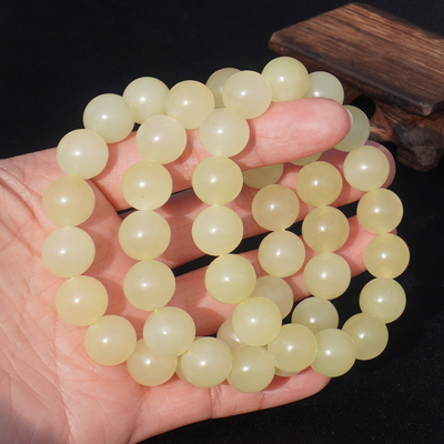 方言新疆且末料冰底猫眼黄口手串