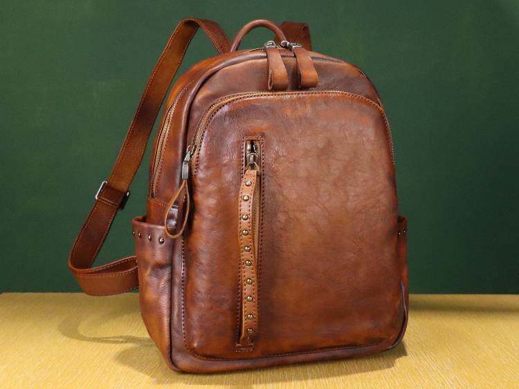 美国代购Backpack㊣ 手作铆钉拼色风格复古皮革休闲学院双肩背包
