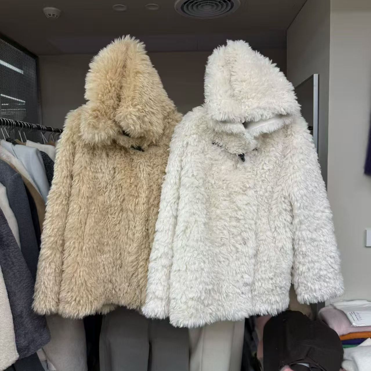 连帽皮毛一体外套女宽松毛毛大衣