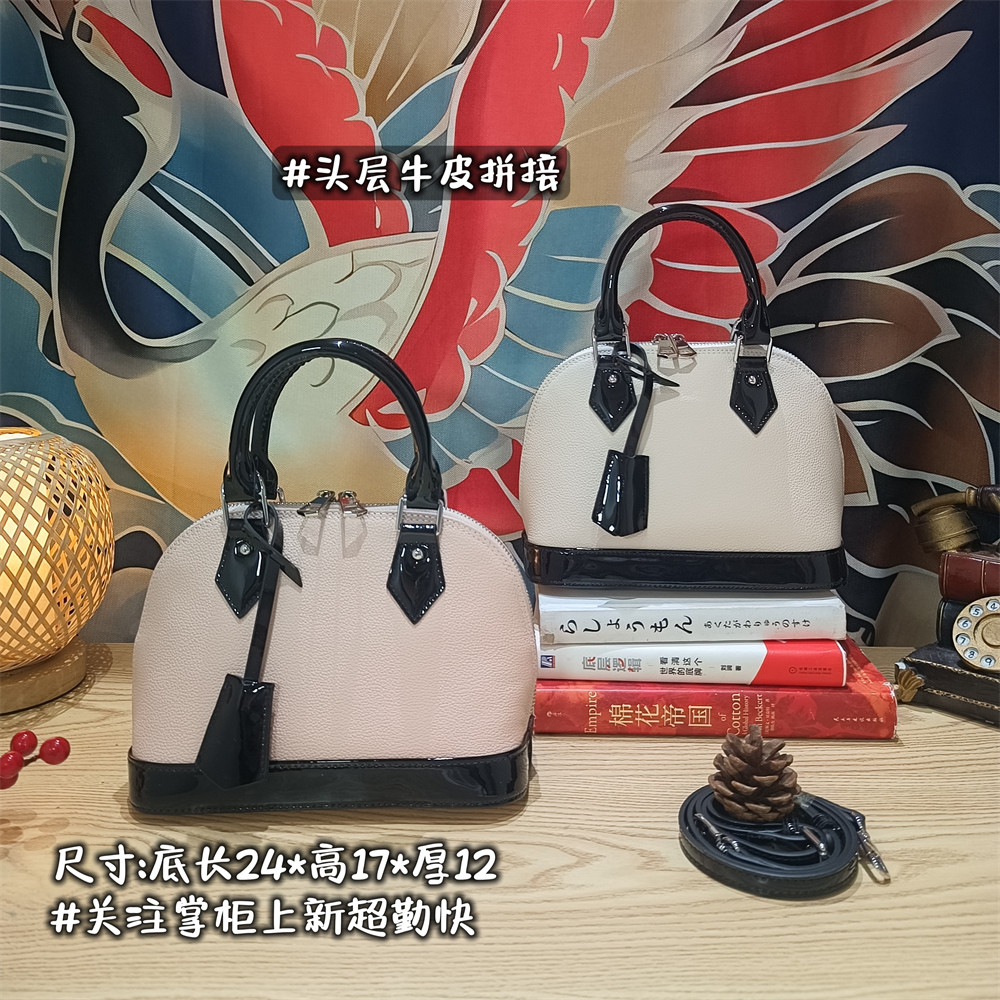 头层油蜡牛皮粉白贝壳手提斜挎包