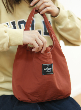 sobag轻便休闲防水尼龙布手拎腋下包女简约文艺抽绳手挽手提小包