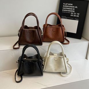 菜篮子 2025牛皮纹纯色手提水桶包通勤流行质感女士单肩斜挎包时尚