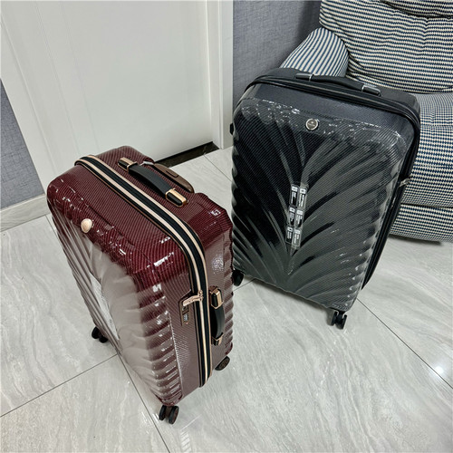 碳纤纹PC万向轮超轻耐摔行李箱