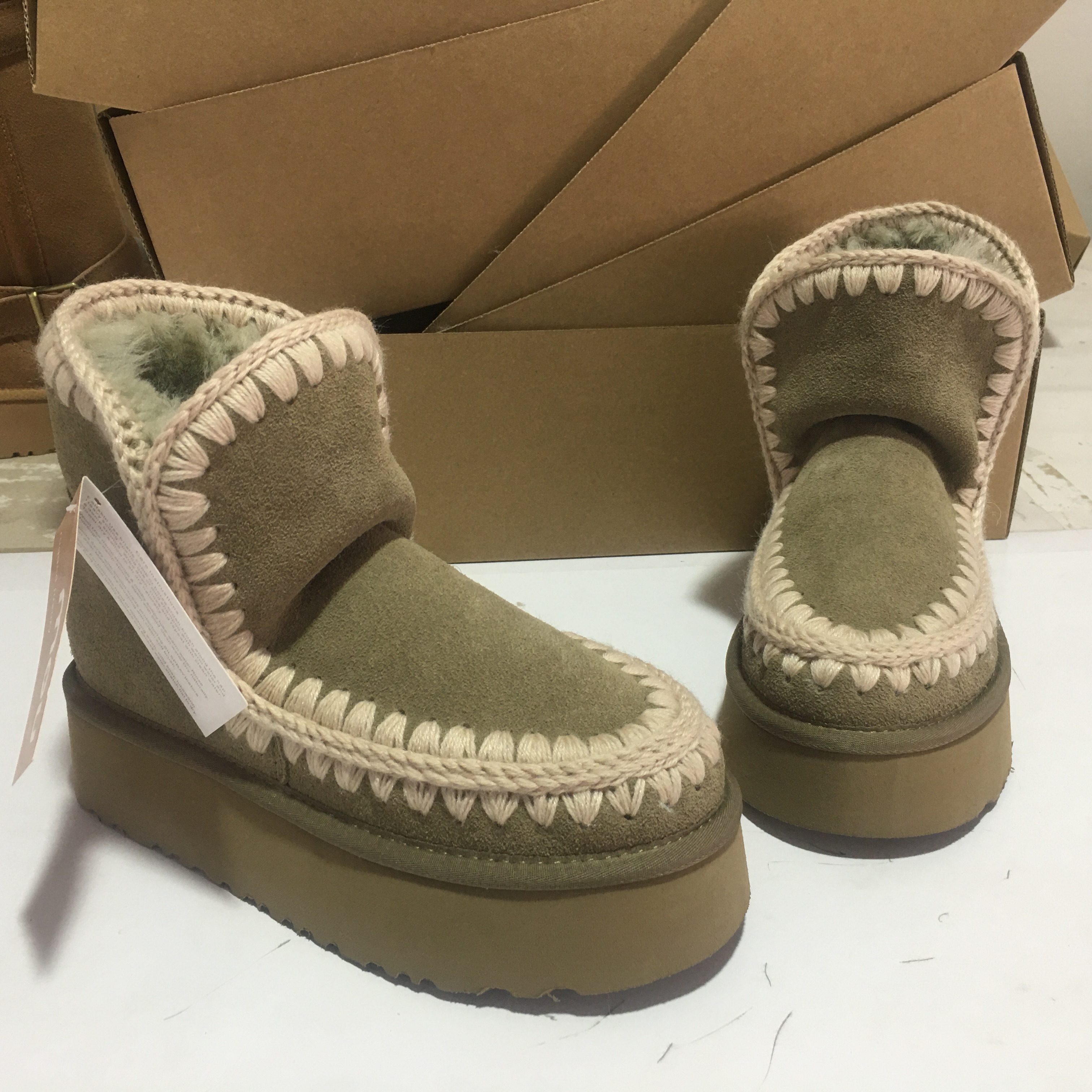 MOU雪地靴羊皮毛一体厚底棉鞋