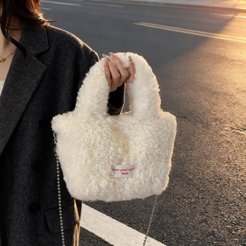 冬季流行毛绒手提包女2025斜挎休闲毛毛链条斜挎包小众手拎水桶包
